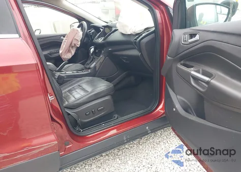 2016 Ford Escape Titanium z USA, uszkodzony, nr VIN 1FMCU9JX2GUB55472